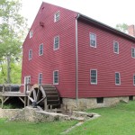 Back view with wheel at Historic Grinnell Mill Bed and Breakfast